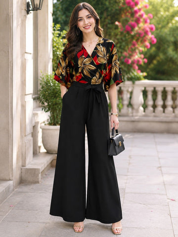 Women Black Printed Wrap-Style Jumpsuit with Waist Tie-Up